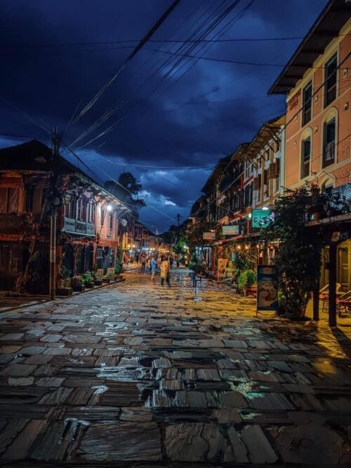 Traditional Newari architecture and historic brick streets in the hilltop town of Bandipur, Nepal, a scenic stop on Himalayan tour routes.