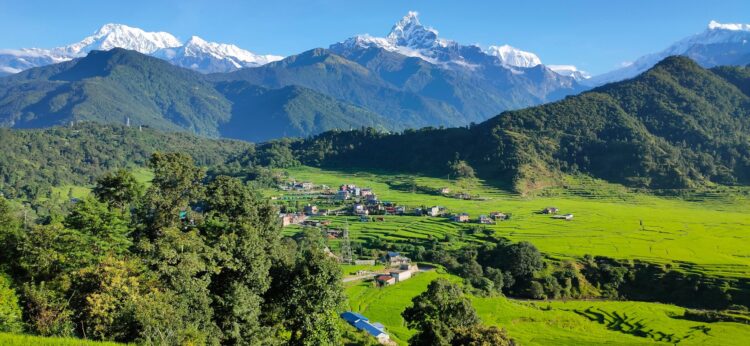 Magnificent view of Mount Machapuchare (Fishtail Mountain) in the Annapurna Himalayas, a famous scenic landmark visible from Pokhara, Nepal.